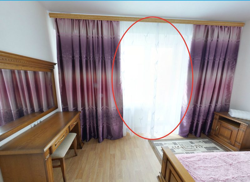 The overexposed area of ​​the window. You must use a frame of another exposure.